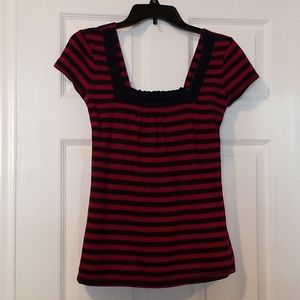 Dark red and navy striped knit top.